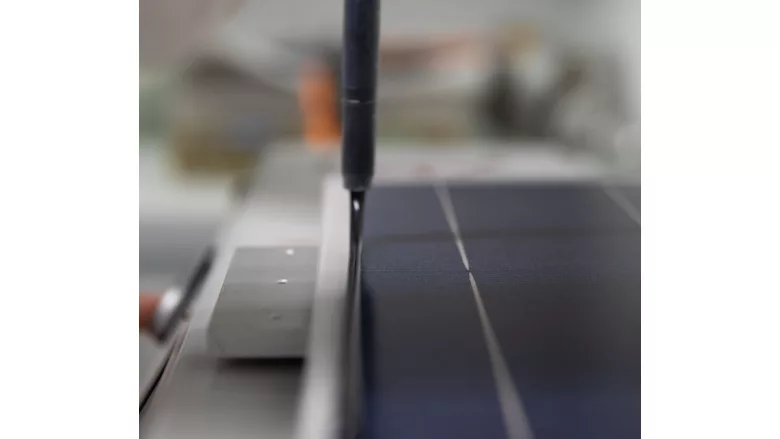 Picture of an adhesive being dispensed