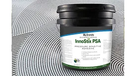 Picture of a black tub of adhesive