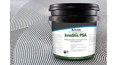 InnoStix PSA Picture of a black tub of adhesive