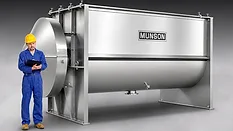 Munson Ribbon Blender Man standing next to a very large stainless steel ribbon blender