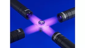 Picture of four LED lights pointing to one object