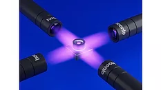 Picture of four LED lights pointing to one object