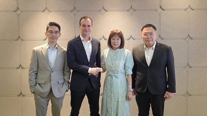 Picture of three men and one woman