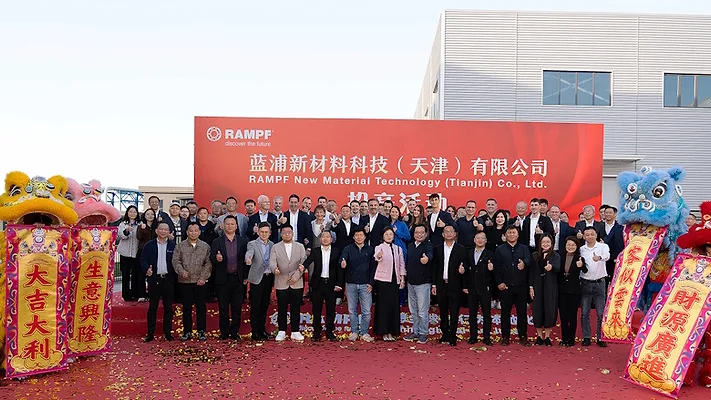 Picture of a group of people standing in front of a building