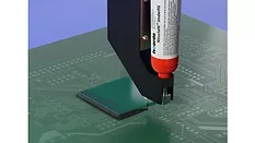Picture of an adhesive being dispensed