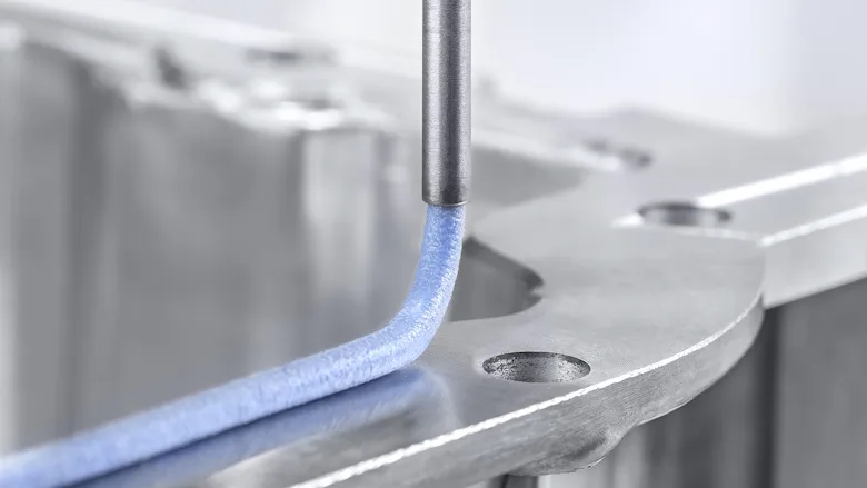 Dispensing of a blue sealant
