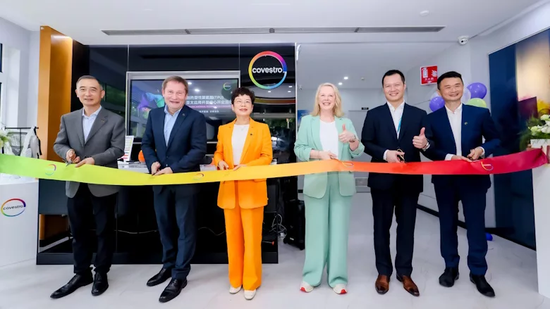 Picture of people cutting a ribbon