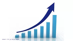GettyImages-117247268 bar chart going up Image of a blue bar chart with arrow pointing up