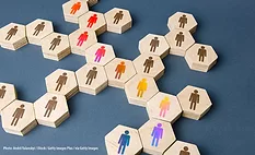 Image of scrabble pieces with pictures of people