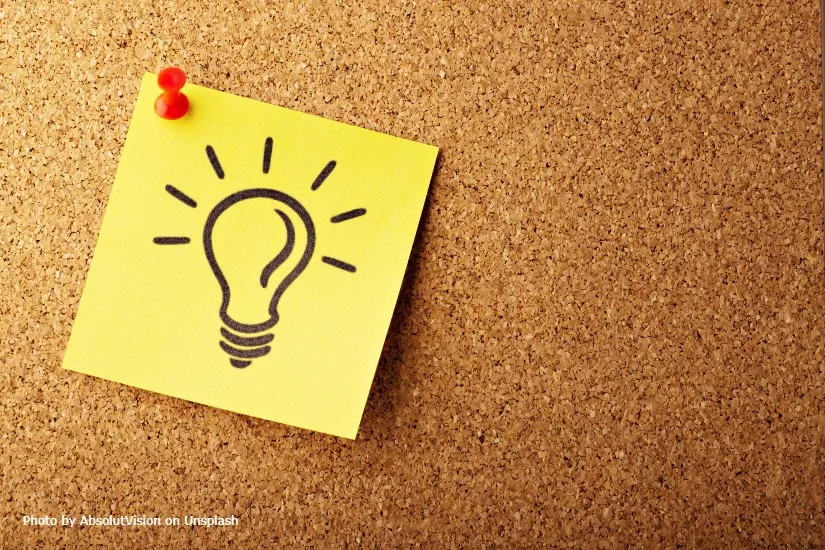 Photo of a sticky note with drawing of a lightbulb
